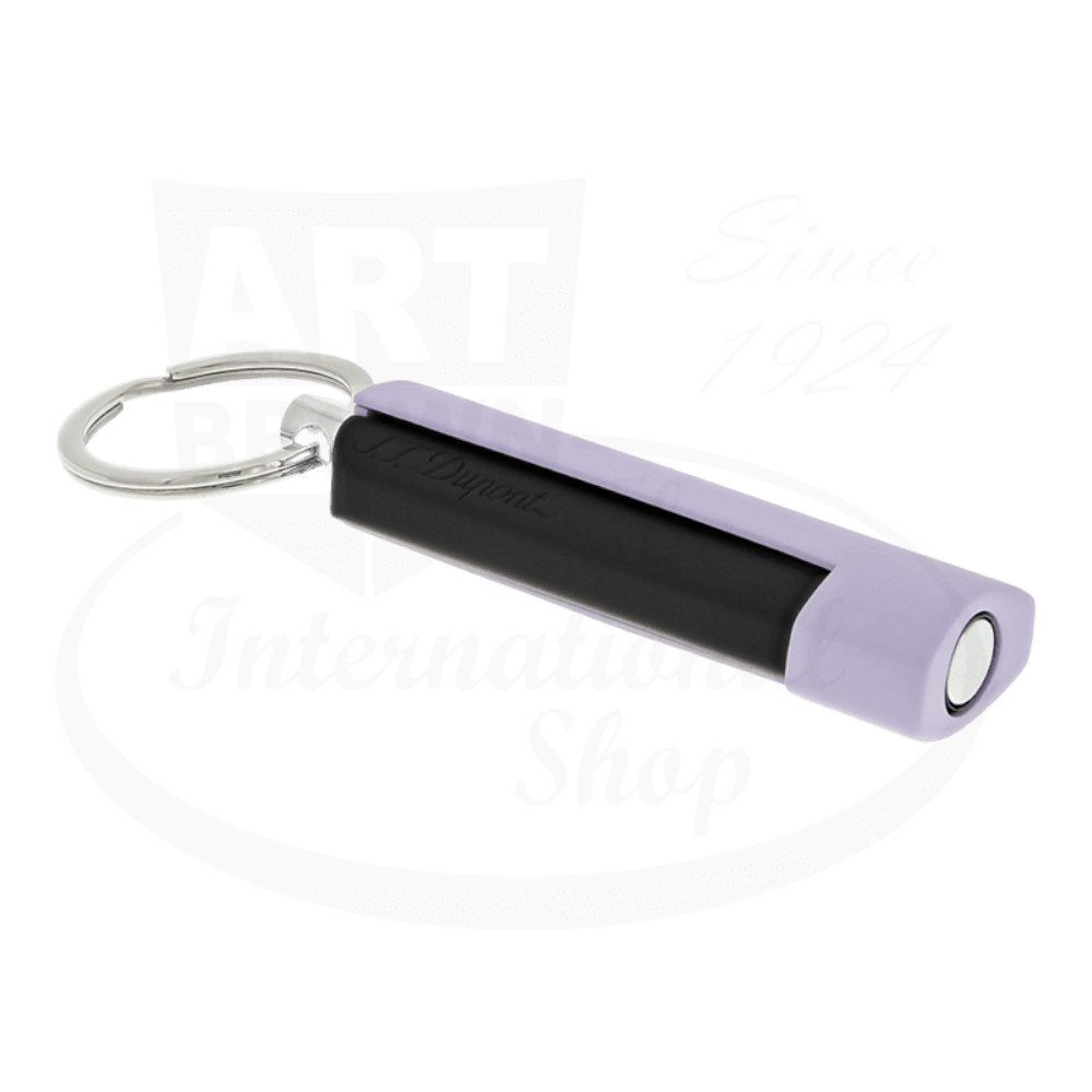 S.T. Dupont 003262K Velvet cigar punch in chrome and matte black with lilac accents, featuring keyring attachment and cylindrical design