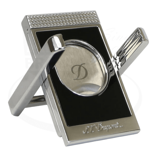 S.T. Dupont 003415 chrome and black lacquer cigar cutter stand with diamond pattern texture, integrated blade rest and monogrammed D logo on brushed metal base