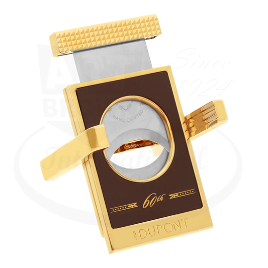 S.T. Dupont x Padron limited edition cigar cutter with stand, 003454, finished with brown lacquer and gold accents, seen with blade pulled up.