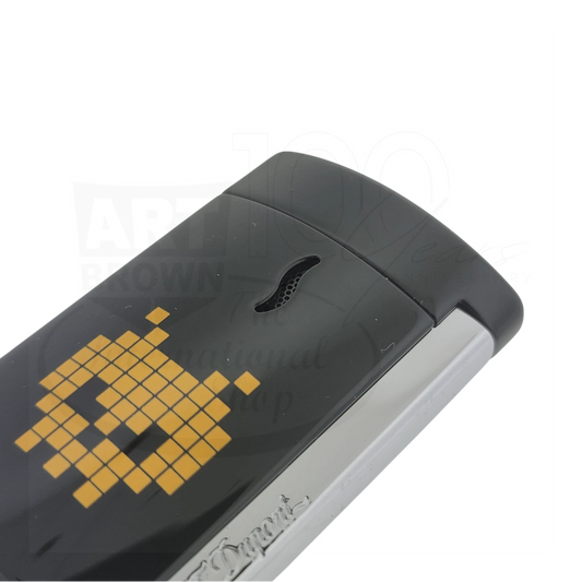 Black luxury lighter with yellow pixelated alien design and sleek silver trim detail