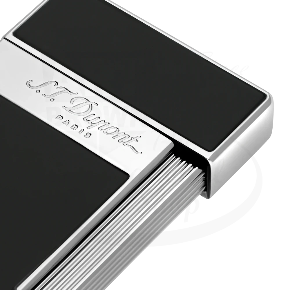Corner of S.T. Dupont slimmy torch lighter with black lacquer and chrome finish