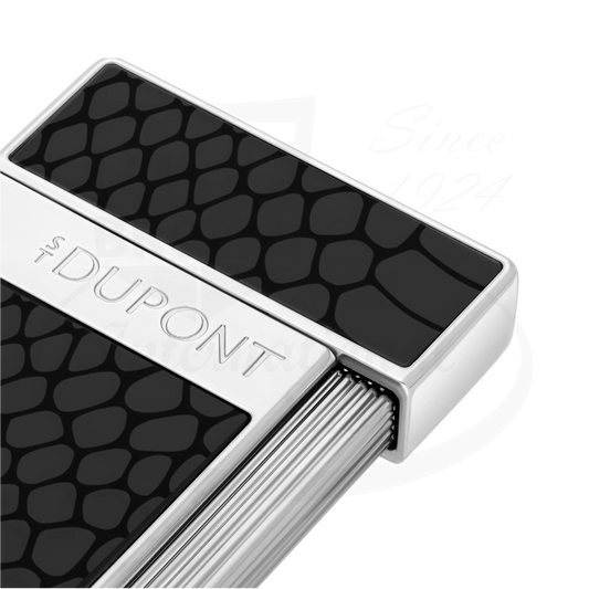 Closeup of details on S.T. Dupont Slimmy lighter with snake scale guilloche in black.
