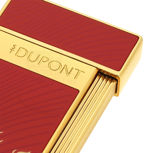 S.T. Dupont Limited Edition Slimmy Year of The Horse Red & Gold Lighter, 028080 close-up of gold trim and red lacquer panel, square image 2