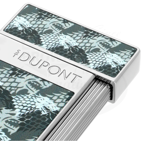 Close up of S.T. Dupont x Game of Thrones Slimmy torch lighter with grey and white wolf motif.