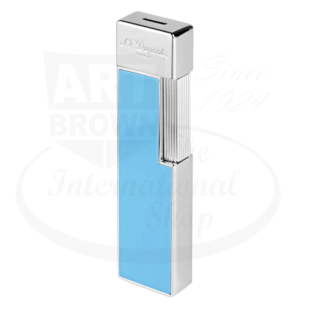 S.T. Dupont Twiggy Shiny Light Blue Lacquer & Chrome Lighter featuring a sleek, vertical design with chrome accents and light blue lacquered finish. Elegant luxury torch lighter with vertical ribbed pattern and polished chrome top displaying the S.T. Dupont logo.