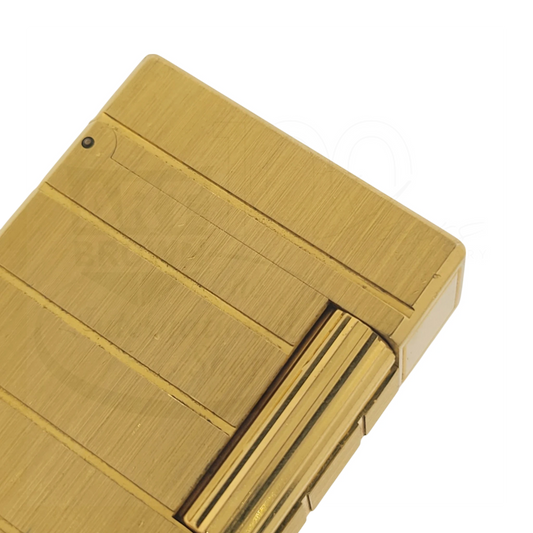 S.T. Dupont Ligne 1 014244 soft flame lighter in brushed gold with horizontal engraved lines and sleek rectangular body