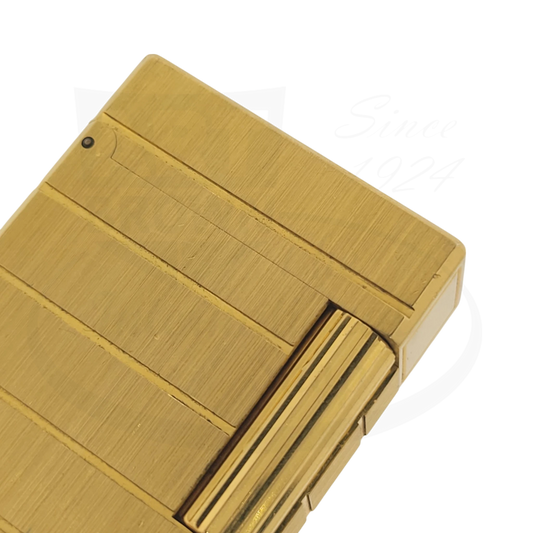 Preowned S.T. Dupont Ligne 1 014244 brushed gold metal lighter with horizontal line design, compact rectangular shape