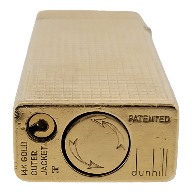 gold-toned vintage Dunhill luxury lighter with hobnail texture and patented mechanism detail