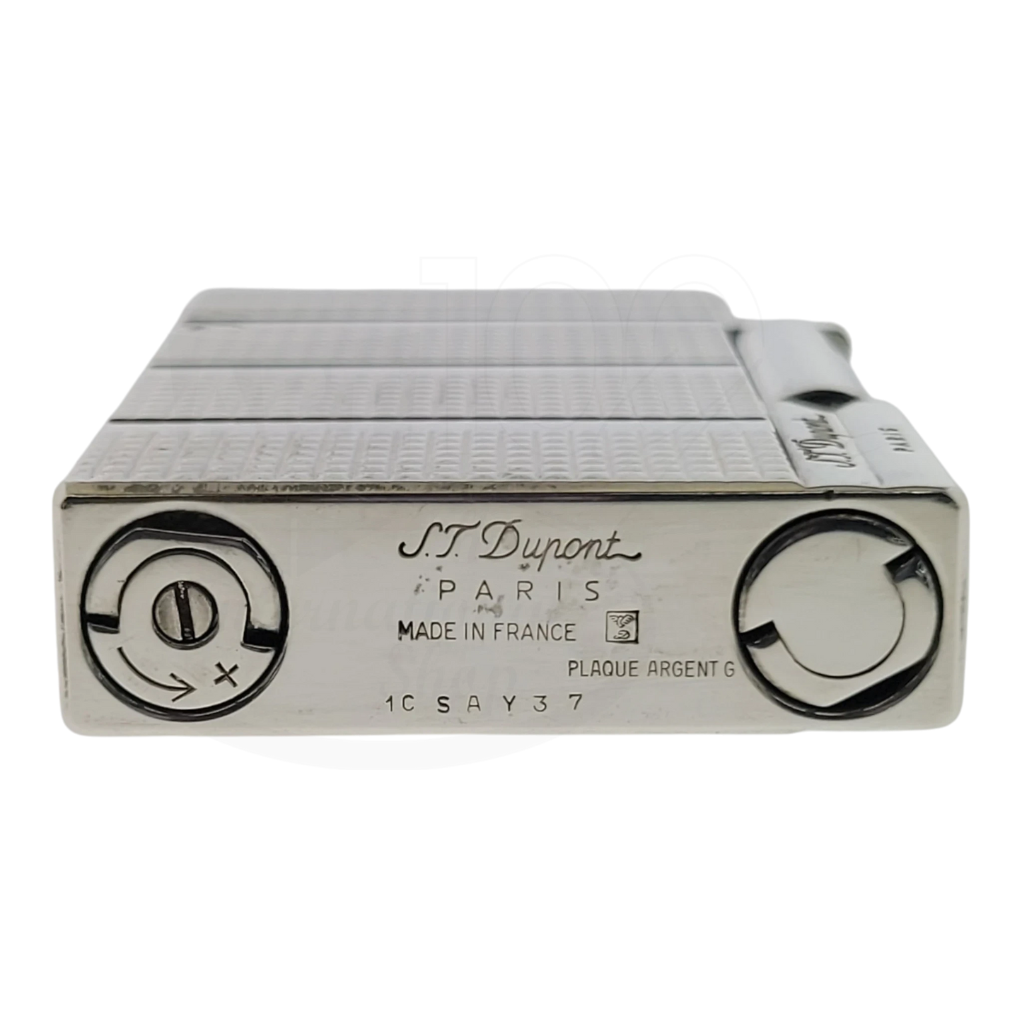 S.T. Dupont Gatsby silver lighter with horizontal diamond head lines, soft flame, engraved base close-up view