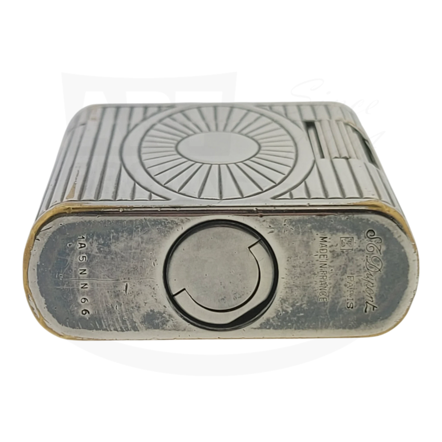 Preowned Vintage S.T. Dupont Soubreny 019105-D1 palladium lighter with Sun Medallion, visible wear, vertical fluting design.