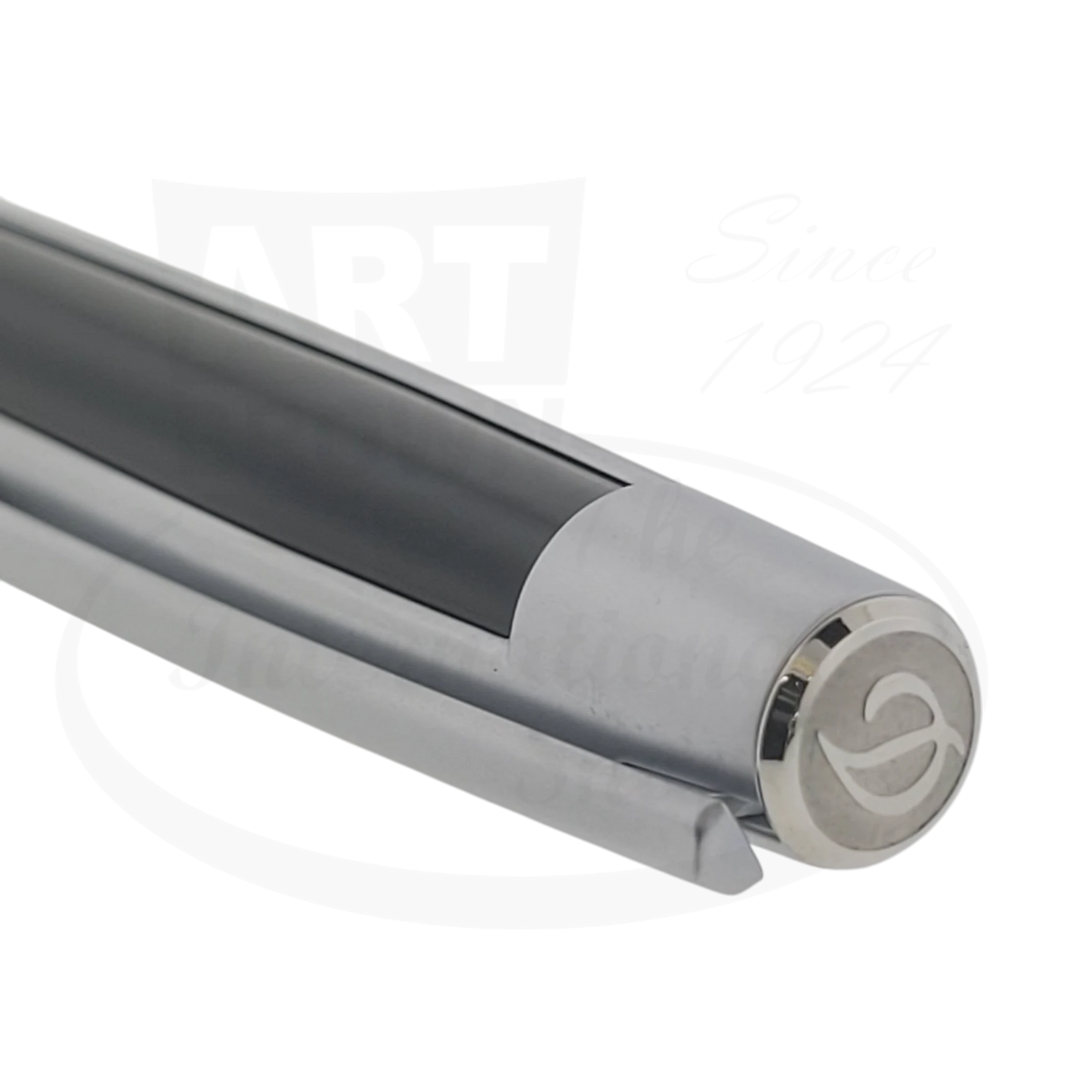 Closeup detail of the iconic "D" logo on the tip of S.T. Dupont defi ballpoint pen.