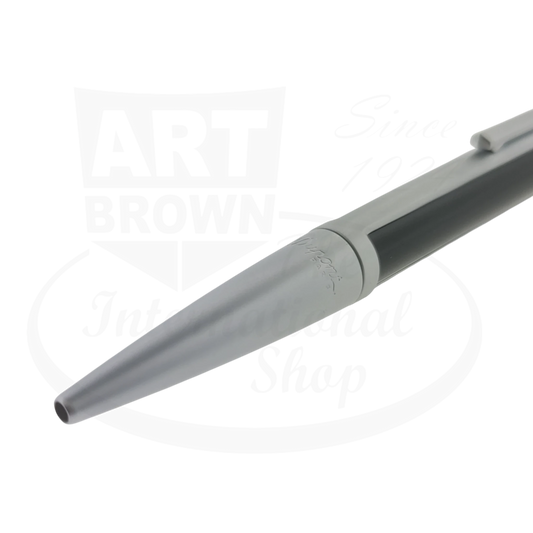 Close up of S.T. Dupont Defi ballpoint pen showing chrome trim and S.T. Dupont signature.