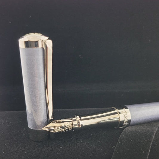 ST Dupont Liberte 460005 fountain pen in pearly grey lacquer and palladium trim, featuring faceted diamond-cut cap top and elegant nib detailing