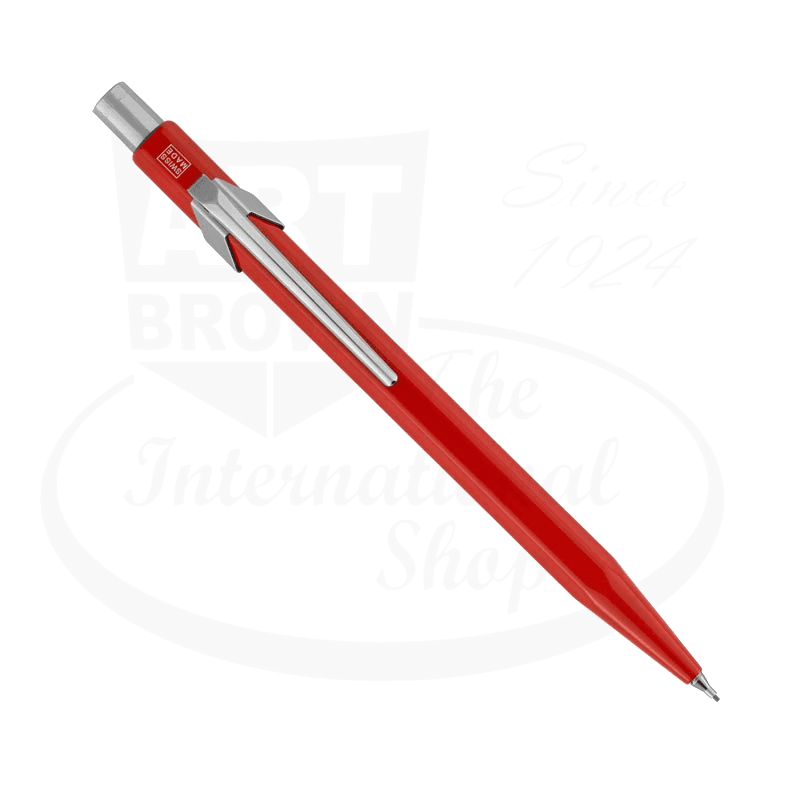 Caran d'Ache 844 metal mechanical pencil featuring red hexagonal barrel, silver accents, and retractable 0.7mm lead mechanism