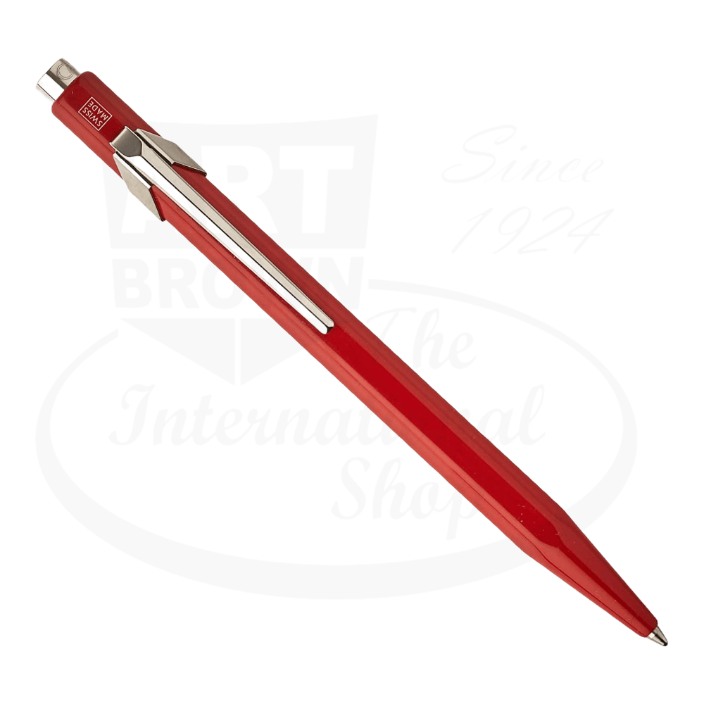 Caran D'Ache 849 Metal Ballpoint Pen Red hexagonal metal body with silver clip sleek design smooth writing