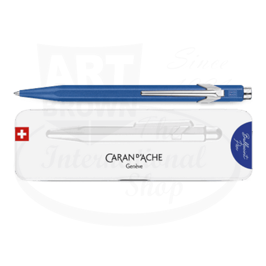 Caran D'Ache 849 Colormat-X metal ballpoint pen in vibrant blue with hexagonal body and silver clip, shown with white storage case featuring Swiss cross logo