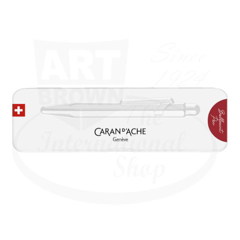 Caran D'Ache 849 Colormat-X Metal ballpoint pen in red, displayed in white branded packaging with Swiss flag emblem