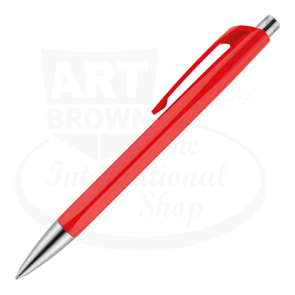Caran D'Ache 888 Infinite ballpoint pen red, synthetic resin hexagonal barrel, metal clip and tip, smooth writing.
