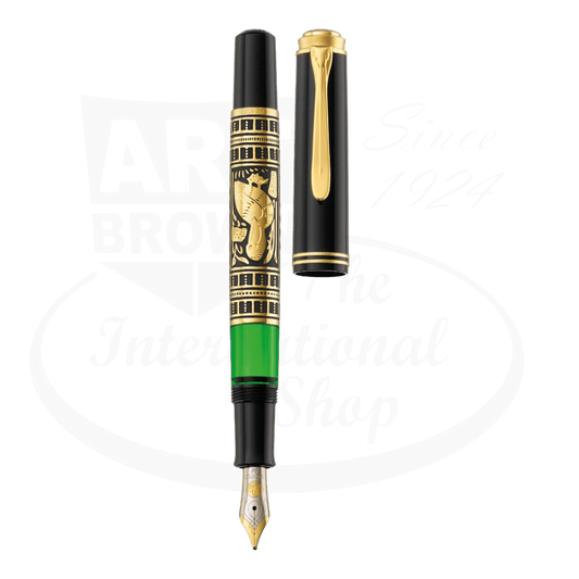 Pelikan 900 Toledo Black F fountain pen with sterling silver barrel, gold-plated ornate engravings, black resin cap, and 18K gold nib against white background