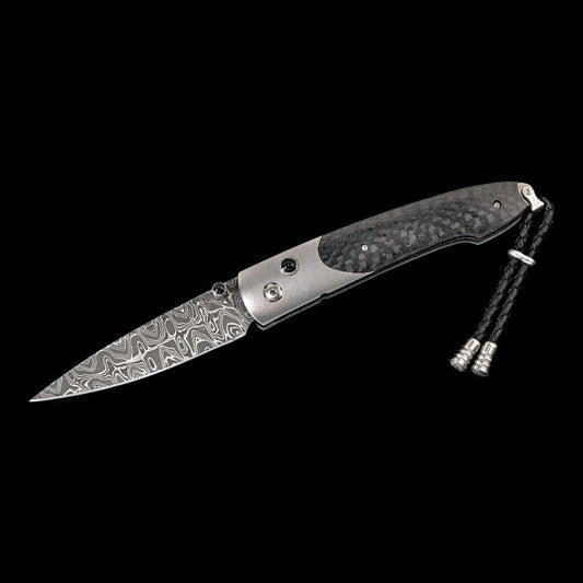 William Henry Lancet Endure folding knife with damascus steel blade, carbon fiber handle, titanium bolster, and black onyx accents