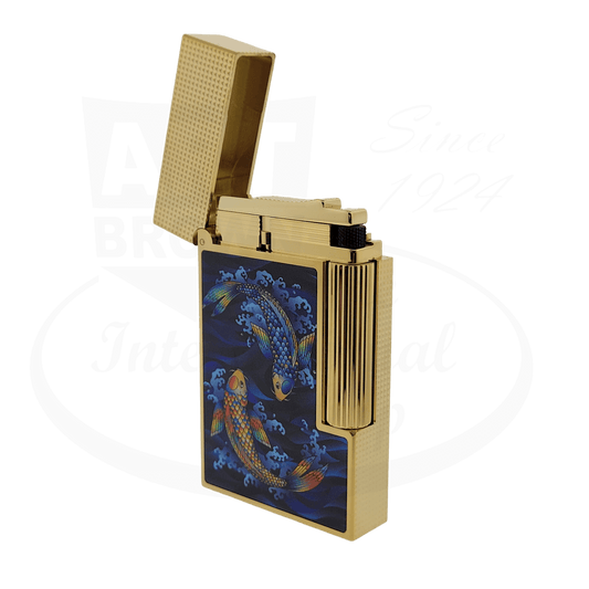 S.T. Dupont Ligne 2 C16397 brass lighter in gold finish with blue lacquered koi fish design, diamond-head pattern, and 24-groove ignition roller