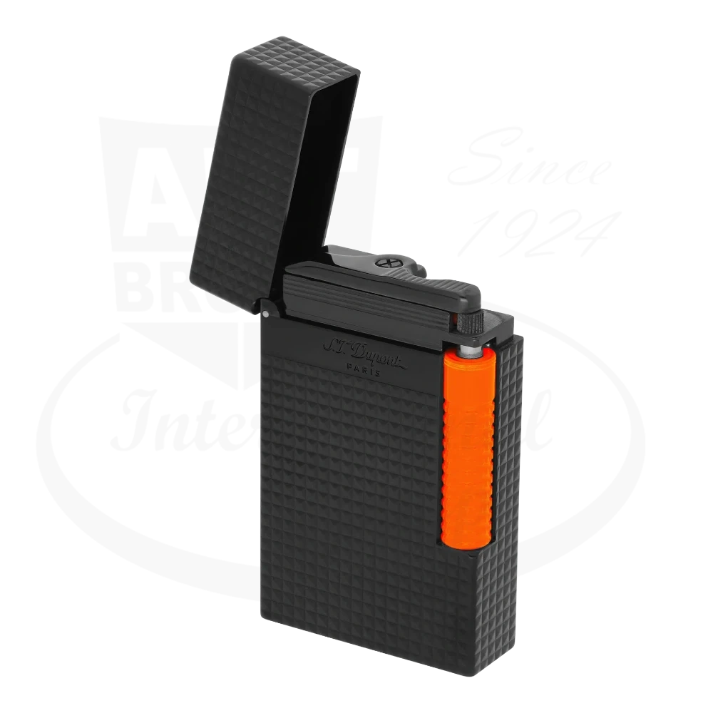 S.T. Dupont Le Grand C23069 lacquered metal lighter in matte black with fluorescent orange trigger, featuring diamond-cut guilloche pattern and dual-flame system