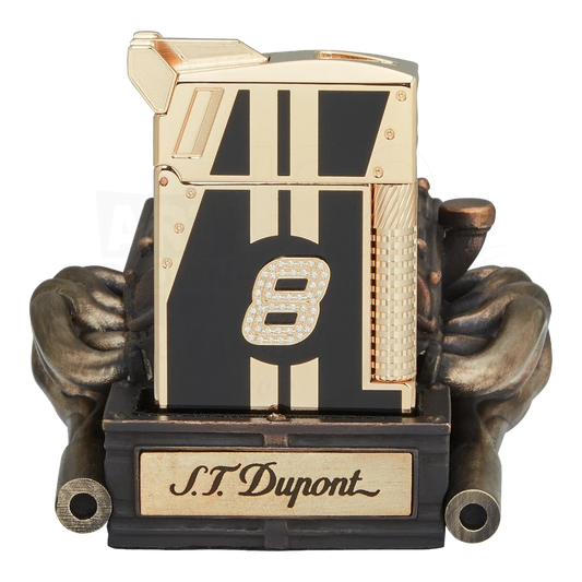 Luxury gold and black S.T. Dupont lighter with diamond accents and racing-inspired design on a detailed metal stand