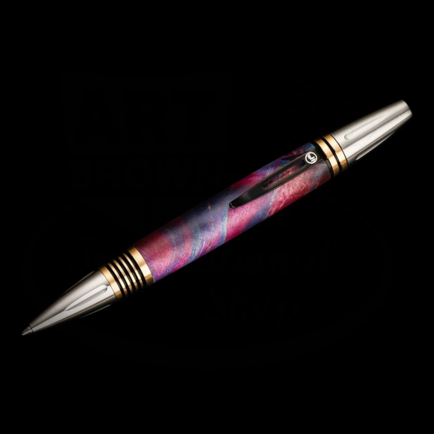 William Henry Caribe executive ballpoint pen, with multicolor dyed Maple Burlwood barrel and brass finish.