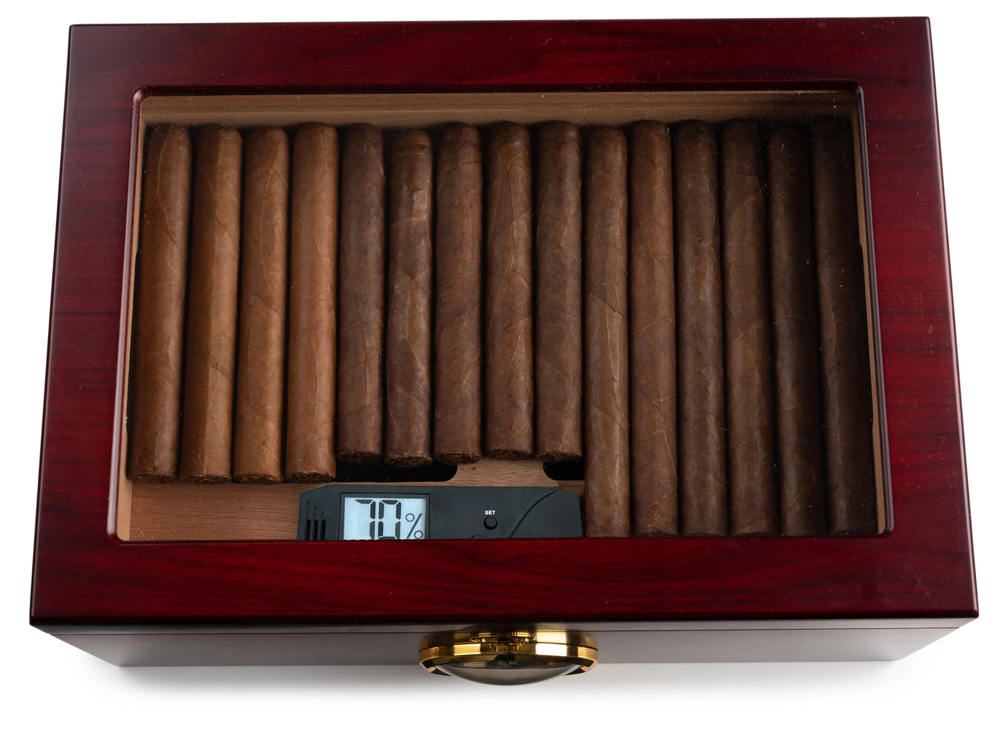 Cigar Oasis Caliber V Slim digital hygrometer inside dark wood humidor with glass top and rows of cigars