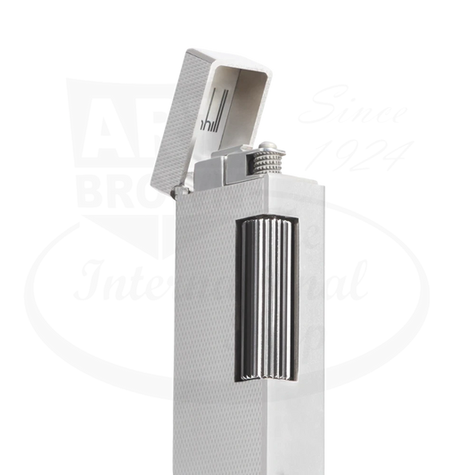 Dunhill Rollagas silver-plated brass lighter featuring barley grain texture pattern, vertical ribbed side panel, and flip-top opening mechanism