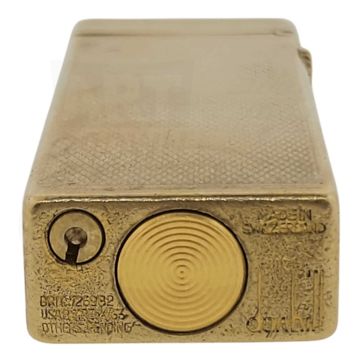 Gold plated Dunhill Anomalies lighter with Barley grain pattern, seen from the bottom with brand engraving