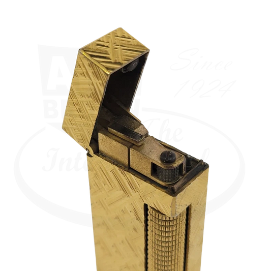 Gold plated Dunhill rollagas brass cigarette lighter with crosshatch pattern with lid opened.