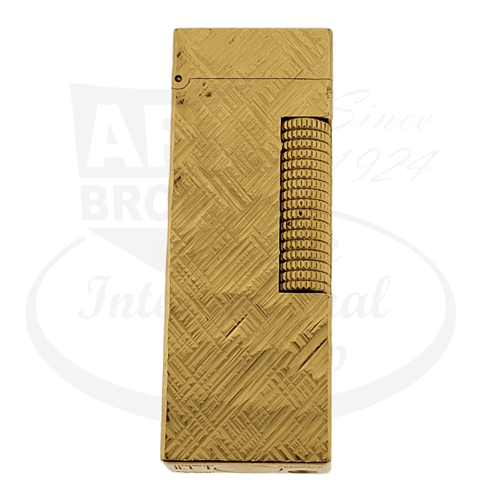 Dunhill Rollagas B57 gold-plated lighter featuring Florentine pattern engraving with textured roller wheel, rectangular vintage design in pristine condition