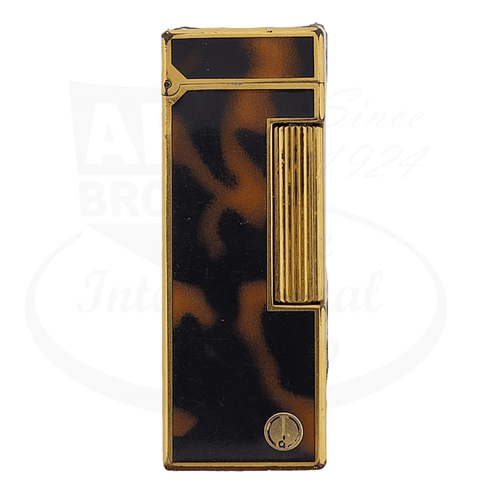 Dunhill Rollagas vintage lighter in tortoiseshell lacquer with gold-plated trim, featuring ribbed side panel and signature logo, 1970s collectible piece