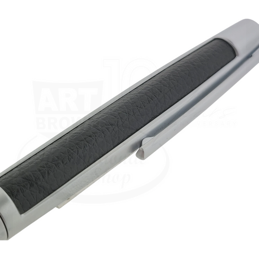 S.T. Dupont Defi Dupont-16 ballpoint pen with black textured leather and chrome clip close-up view