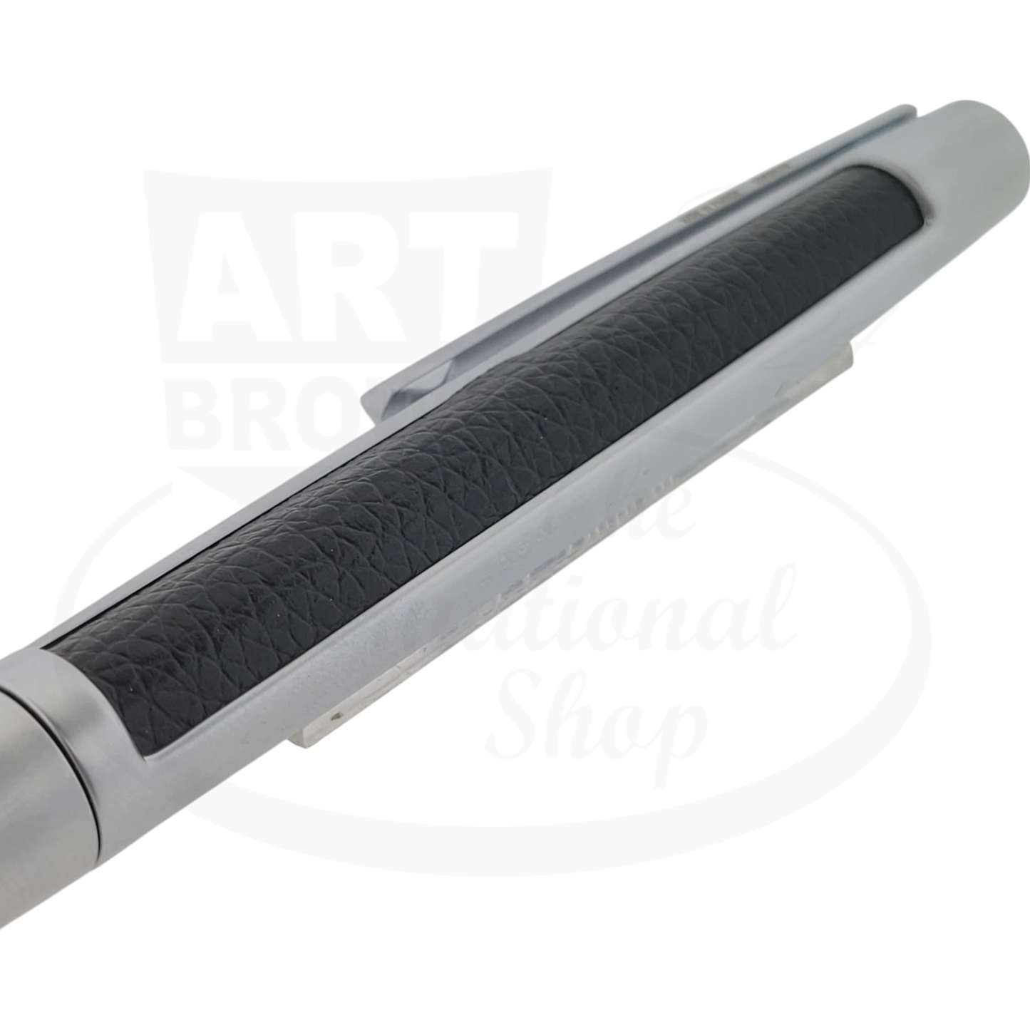 Close up view of the textured leather and chrome accents on customized S.T. Dupont defi ballpoint pen.