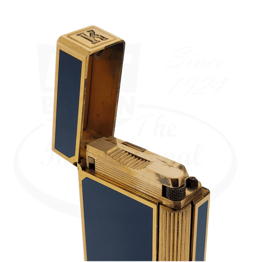 S.T. Dupont Line 1 vintage lighter in blue lacquer and gold-plated brass, featuring ribbed texture, engraved K monogram, open lid displaying internal mechanism