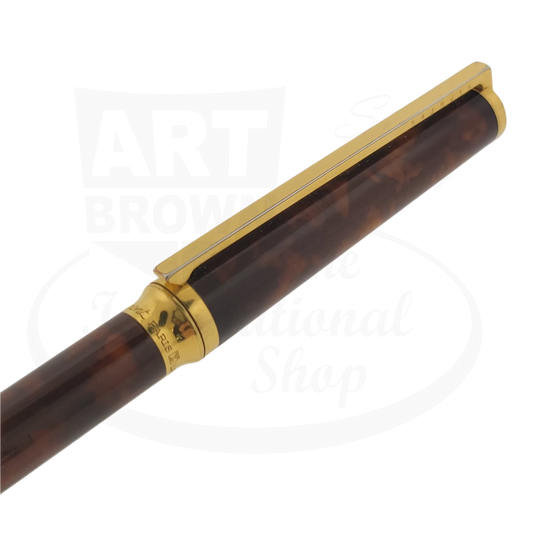 Close up of clip on S.T. Dupont Classique ballpoint pen with tortoise shell lacquer.