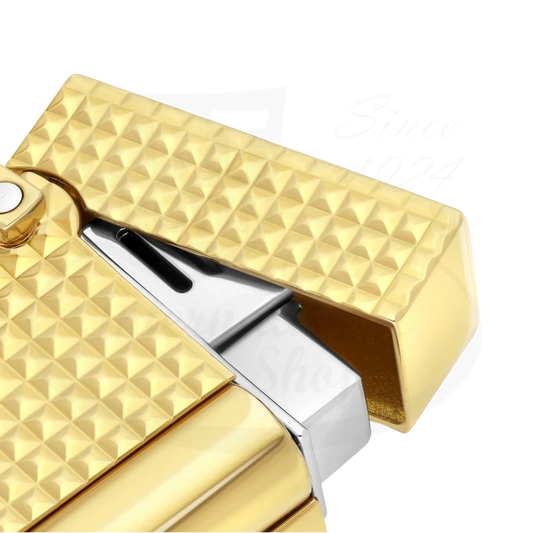 S.T. Dupont Ligne 2 K27067CH gold-plated brass lighter with diamond guilloche pattern and silver-tone latch, featuring textured pyramidal surface