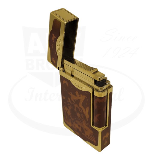 S.T. Dupont Maduro 016881 luxury lighter in tortoiseshell brown lacquer with gold trim, flipped open showing internal mechanism and flame adjuster
