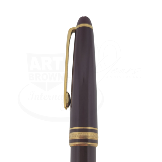 Montblanc Meisterstück Classique 164 ballpoint pen with burgundy resin body and gold trim clip and bands