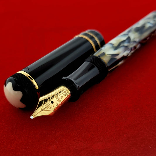 Montblanc Writers Edition Oscar Wilde fountain pen with black resin cap, marbled green barrel, gold-plated trim, 18k gold nib