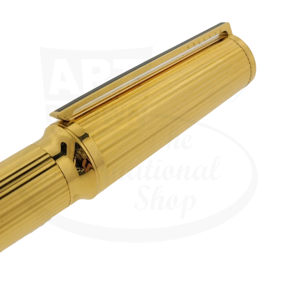 S.T. Dupont Montparnasse Grand fountain pen in gold-plated brass with vertical guilloche pattern, featuring classic clip and pointed cap