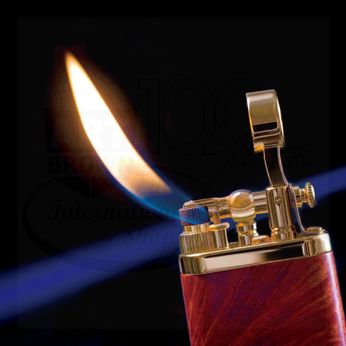 IM Corona 64 Old Boy briarwood soft flame lighter with polished gold metal accents and visible ignition mechanism
