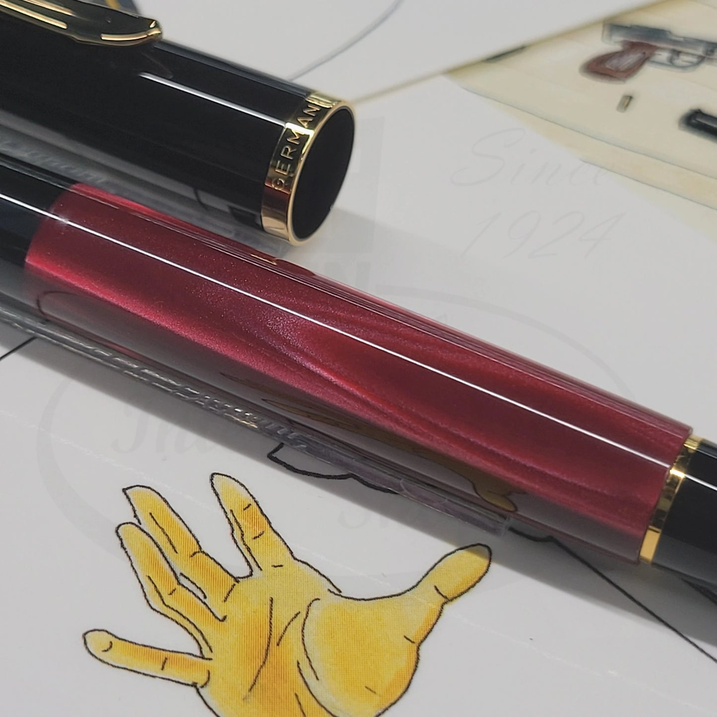 Pelikan Classic M200 827379 marbled red resin barrel with black cap and gold-plated accents fountain pen