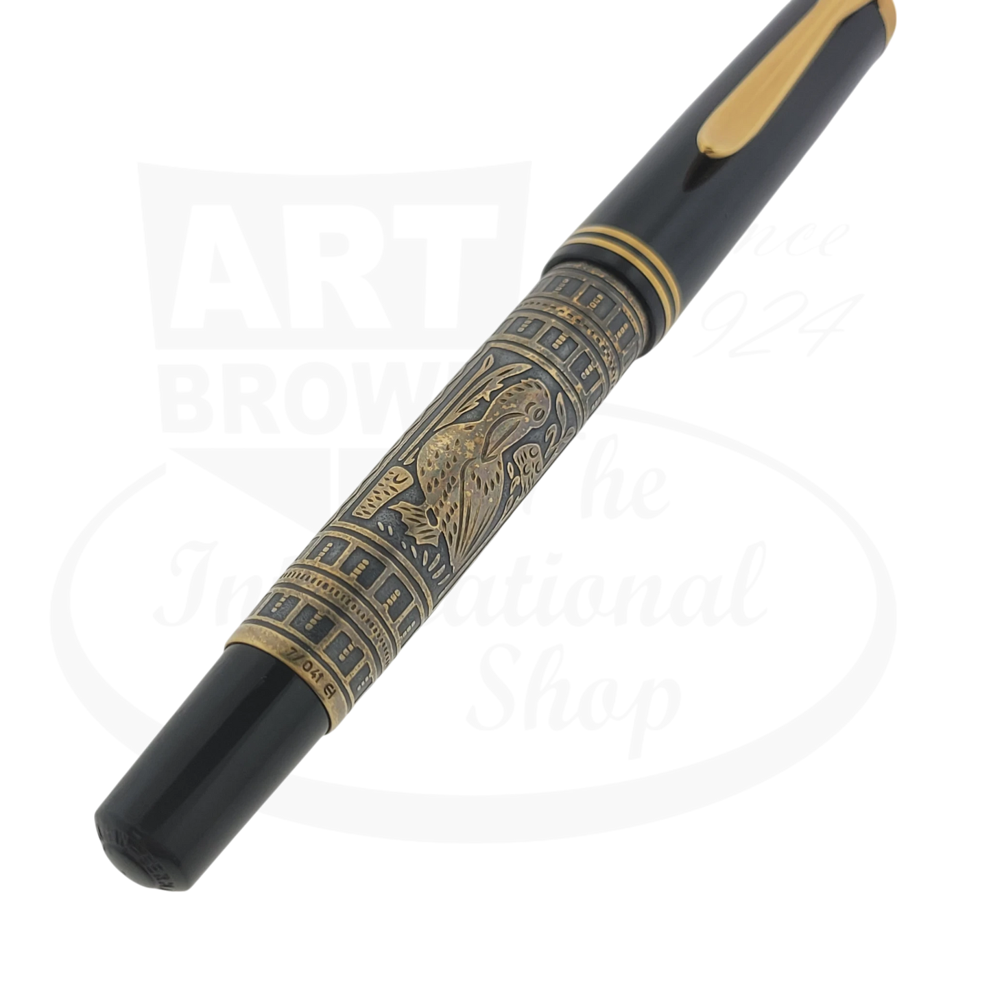 Pelikan M700 Toledo vintage fountain pen with hand-engraved gold-plated silver barrel featuring ornate pelican design and black cap