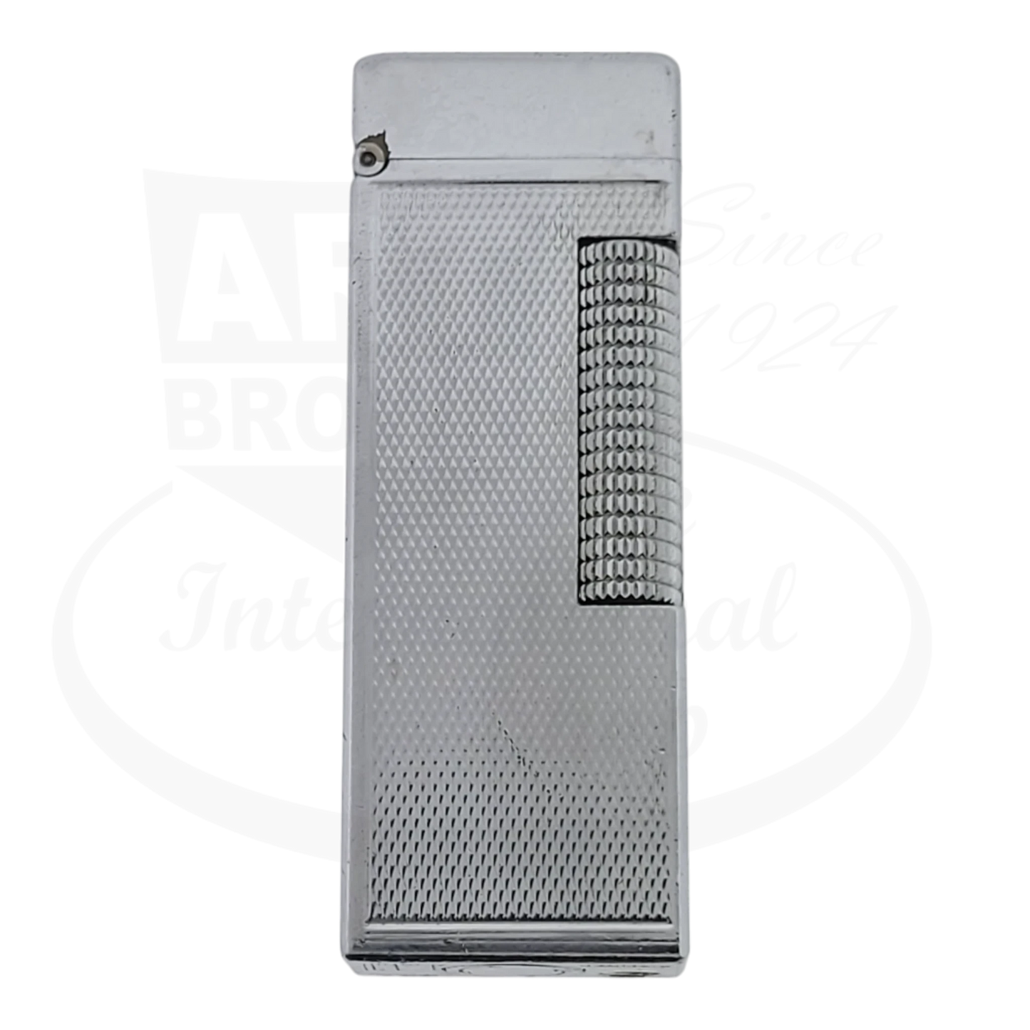 Silver plated Dunhill Anomalies lighter with barley grain pattern, seen from the front.