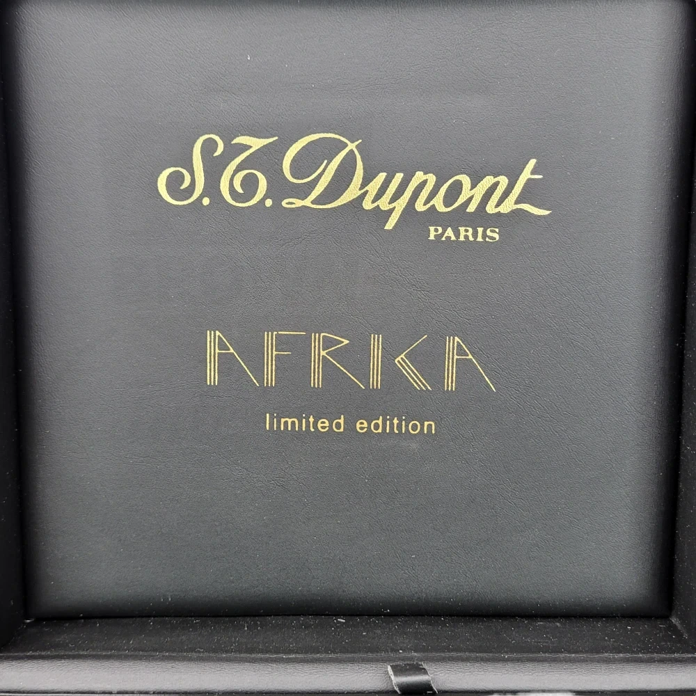 S.T. Dupont Afrika Limited Edition 026210 black leather presentation box with gold embossed branding and lettering, luxury table lighter packaging