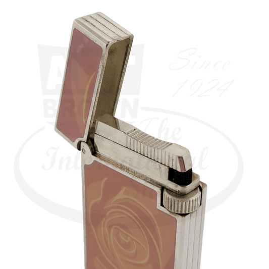 S.T. Dupont Line D Fantasies brass lighter in pink lacquer with engraved rose pattern, silver-tone metal trim, open lid view showing flint wheel mechanism