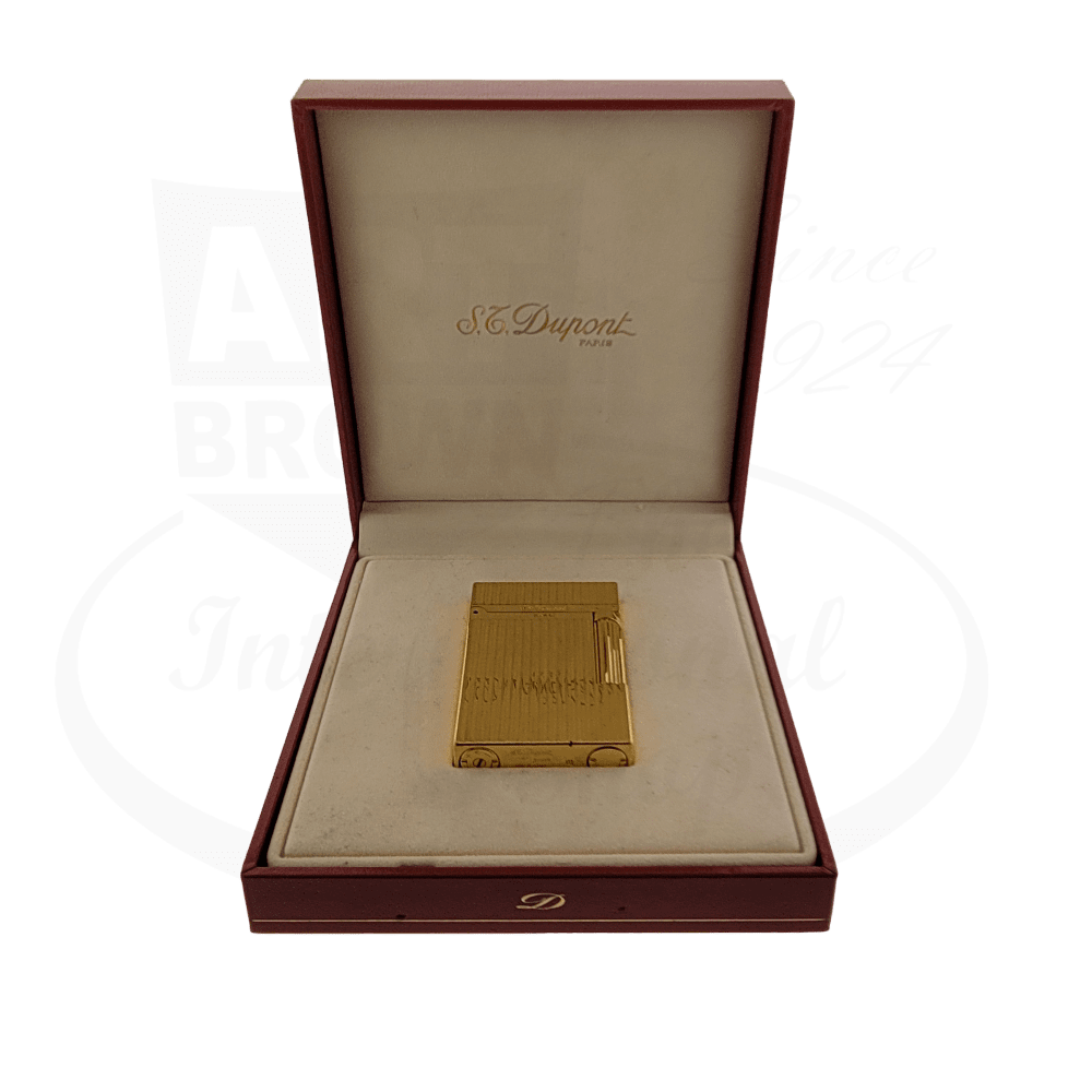 S.T. Dupont Ligne 2 Montparnasse 016827-D2 brass lighter with 24K gold vertical lines finish displayed in burgundy presentation box